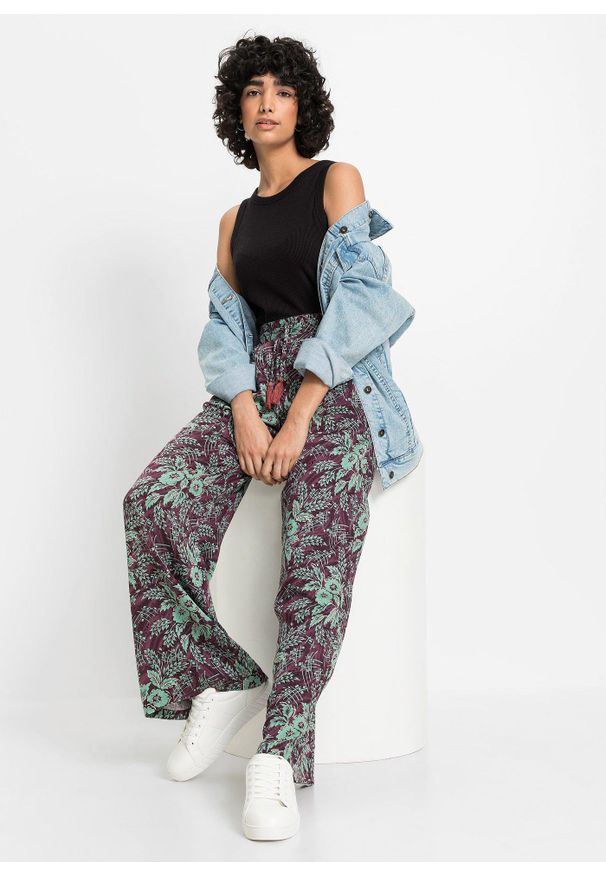 bonprix - Spodnie palazzo z lejącej wiskozy. Kolor: fioletowy. Materiał: wiskoza, materiał. Wzór: nadruk