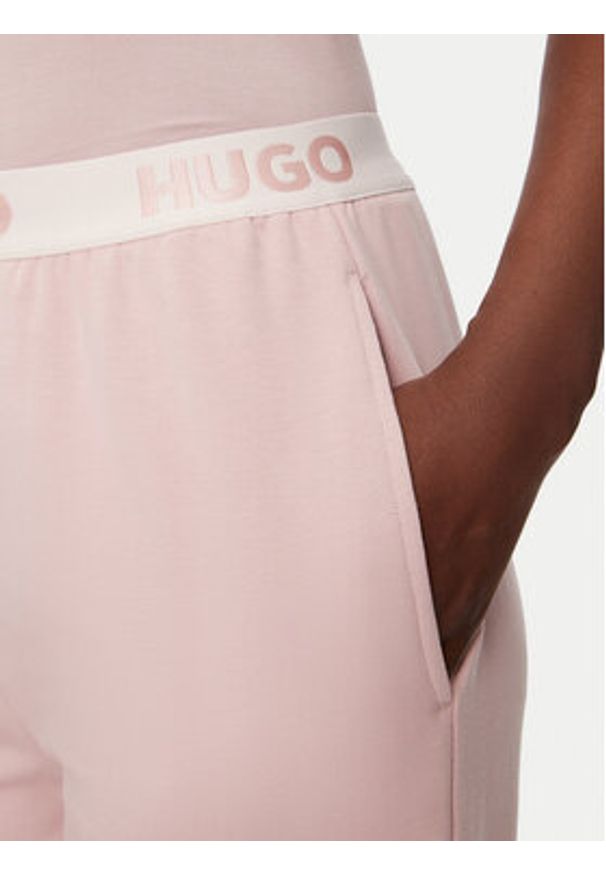 Hugo Spodnie dresowe Sporty Logo 50520499 Różowy Regular Fit. Kolor: różowy. Materiał: bawełna, syntetyk