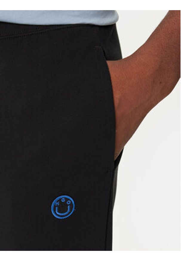 Hugo - HUGO Spodnie dresowe Nompio 50522360 Czarny Regular Fit. Kolor: czarny. Materiał: bawełna