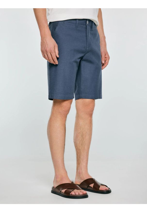 Big-Star - Szorty męskie chinosy niebieskie Rossino 401. Kolor: niebieski. Materiał: bawełna, elastan, tkanina. Sezon: lato. Styl: klasyczny, elegancki