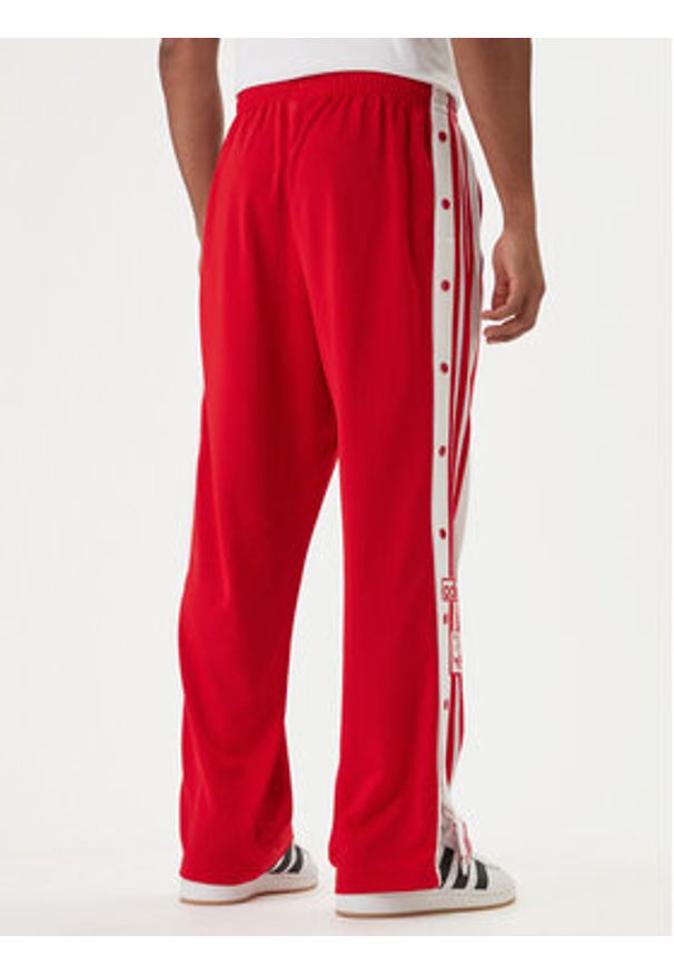 Adidas - adidas Spodnie dresowe Adibreak Classic KD4093 Czerwony Regular Fit. Kolor: czerwony. Materiał: syntetyk
