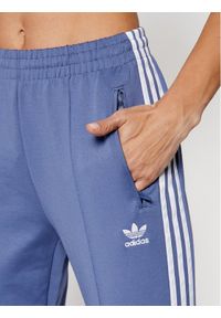 Adidas - adidas Spodnie dresowe Primeblue Sst Track GN2942 Niebieski Slim Fit. Kolor: niebieski. Materiał: dresówka #3
