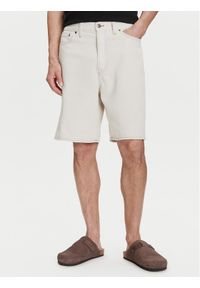 GAP - Gap Szorty jeansowe 781609 Beżowy Loose Fit. Kolor: beżowy. Materiał: bawełna
