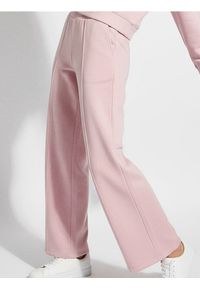 Sinsay - Spodnie wide leg z przeszyciami z domieszką wiskozy - różowy. Kolor: różowy. Materiał: wiskoza #1