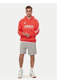 Adidas - adidas Bluza House of Tiro IV8123 Pomarańczowy Loose Fit. Kolor: pomarańczowy. Materiał: bawełna