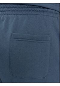 Reebok Spodnie dresowe Archive Essentials IM1526 Niebieski Regular Fit. Kolor: niebieski. Materiał: bawełna #3