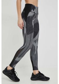 Reebok legginsy treningowe Lux Perform kolor szary wzorzyste. Kolor: szary. Materiał: skóra, dzianina, materiał. Wzór: ze splotem. Sport: fitness #1