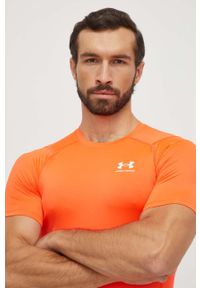 Under Armour t-shirt treningowy kolor czerwony gładki. Kolor: pomarańczowy. Materiał: skóra, materiał. Długość rękawa: raglanowy rękaw. Wzór: gładki #2