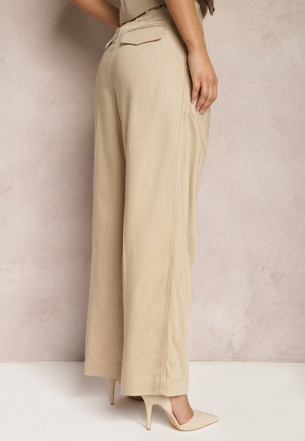 Renee - Beżowe Szerokie Spodnie High Waist z Kieszeniami Keanne. Okazja: na co dzień. Stan: podwyższony. Kolekcja: dla wysokich. Kolor: beżowy. Styl: casual