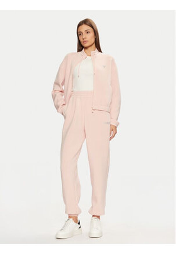 Guess Spodnie dresowe V4BB13 K7UW2 Różowy Regular Fit. Kolor: różowy. Materiał: wiskoza