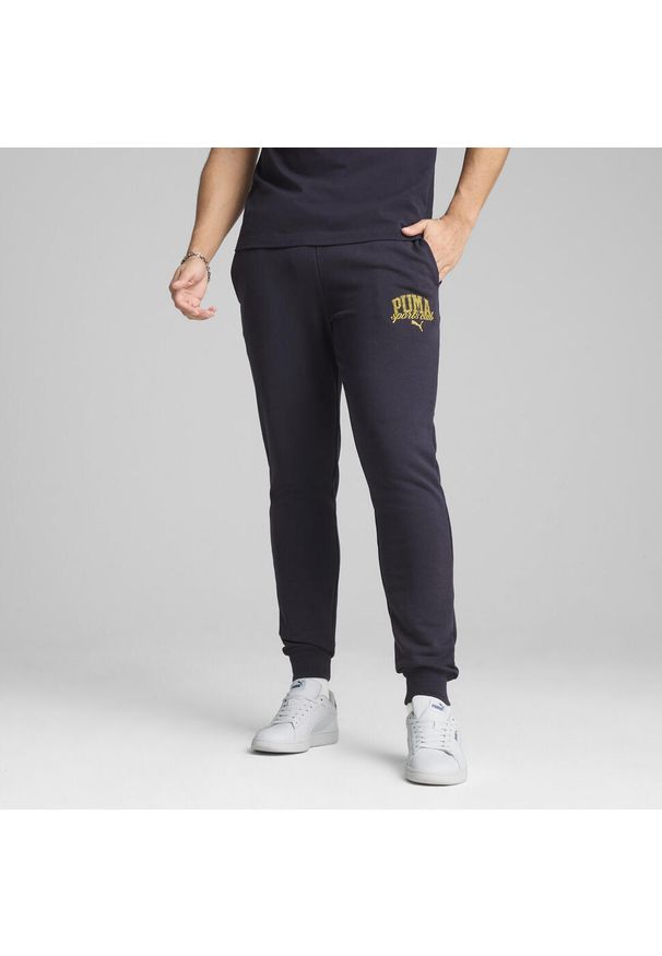 Puma - Męskie spodnie dresowe PUMA Class PUMA New Navy Blue. Kolor: niebieski. Materiał: dresówka. Wzór: nadruk. Sport: fitness