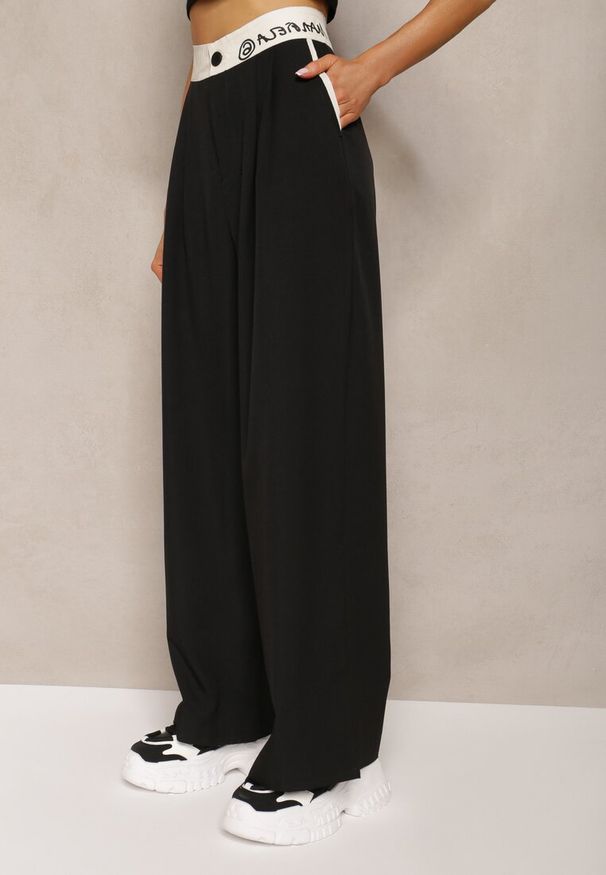 Renee - Czarne Spodnie Palazzo High Waist z Szerokimi Nogawkami z Zapięciem na Guziki i Zamek Lomedia. Okazja: na spotkanie biznesowe. Stan: podwyższony. Kolekcja: plus size. Kolor: czarny. Wzór: aplikacja. Styl: klasyczny, biznesowy, sportowy, elegancki