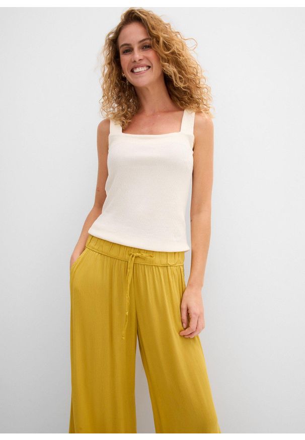 bonprix - Spodnie Marlena z lejącej wiskozy. Kolor: żółty. Materiał: wiskoza