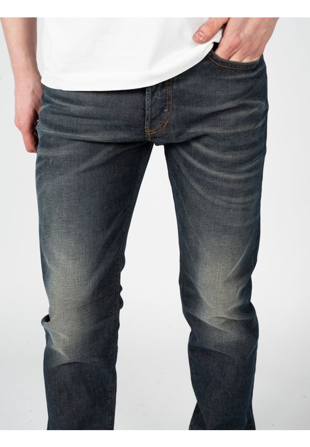 Diesel Jeansy "Buster" | 00SDHB-084ZU | Mężczyzna | Granatowy. Okazja: na co dzień. Stan: obniżony. Kolor: niebieski. Długość: długie. Wzór: aplikacja. Sezon: lato. Styl: klasyczny, casual