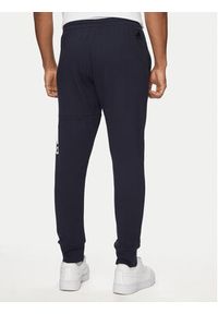 Adidas - adidas Spodnie dresowe Essentials HA4344 Granatowy Regular Fit. Kolor: niebieski. Materiał: bawełna #4