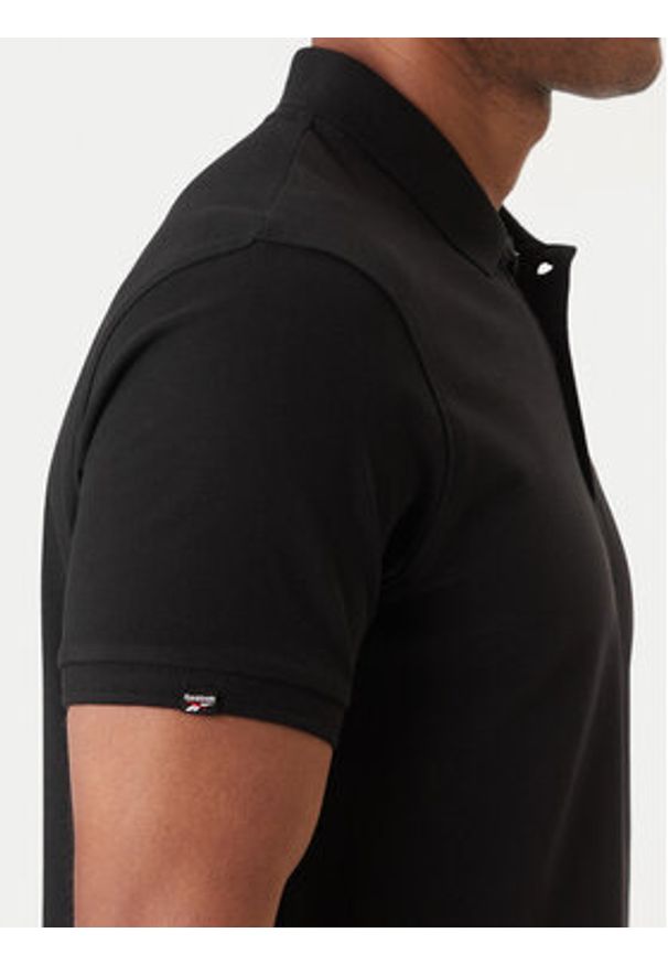 Reebok Polo Breen RK25562CCM Czarny Regular Fit. Typ kołnierza: polo. Kolor: czarny. Materiał: bawełna