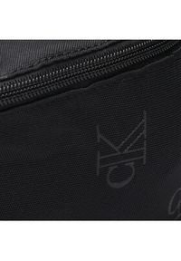 Calvin Klein Jeans Saszetka nerka Sport Essentials Waistbag38 Aop K50K510092 Czarny. Kolor: czarny. Materiał: materiał #4