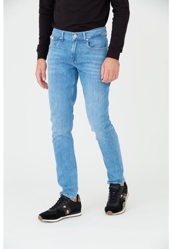 7 FOR ALL MANKIND Jeansy niebieskie Slimmy Tapered. Kolor: niebieski