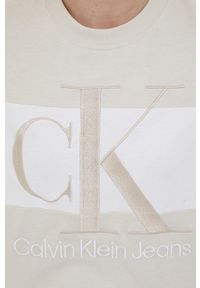 Calvin Klein Jeans t-shirt bawełniany kolor beżowy. Okazja: na co dzień. Kolor: beżowy. Materiał: bawełna. Długość rękawa: krótki rękaw. Długość: krótkie. Styl: casual