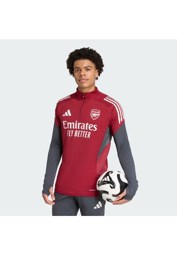 Adidas - Koszulka treningowa Arsenal Tiro 25 Competition. Kolor: czerwony, szary, wielokolorowy, brązowy. Sport: piłka nożna