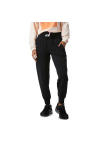Spodnie New Balance WP21503BK - czarne. Kolor: czarny. Materiał: dresówka, materiał #1