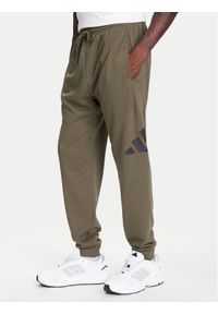 Adidas - adidas Spodnie dresowe Essentials Big Logo JE8970 Khaki Regular Fit. Kolor: brązowy. Materiał: bawełna