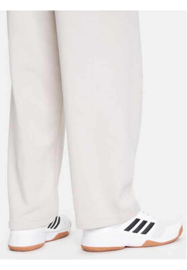 Adidas - adidas Spodnie dresowe Collegiate JM9177 Beżowy Regular Fit. Kolor: beżowy. Materiał: bawełna