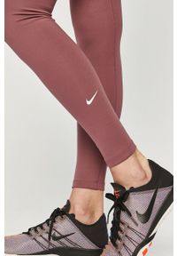 Nike - Legginsy. Stan: podwyższony. Kolor: fioletowy. Materiał: tkanina, włókno, skóra. Technologia: Dri-Fit (Nike) #2