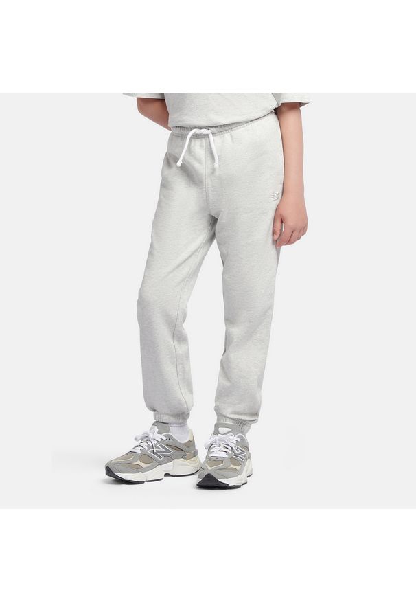 Spodnie dziecięce New Balance LAKB0060AHH – szare. Kolor: szary. Materiał: bawełna, dresówka