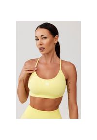 ROUGH RADICAL - Stanik sportowy bezszwowy Rough Radical Seamless Glow Bra. Kolor: żółty. Sport: joga i pilates