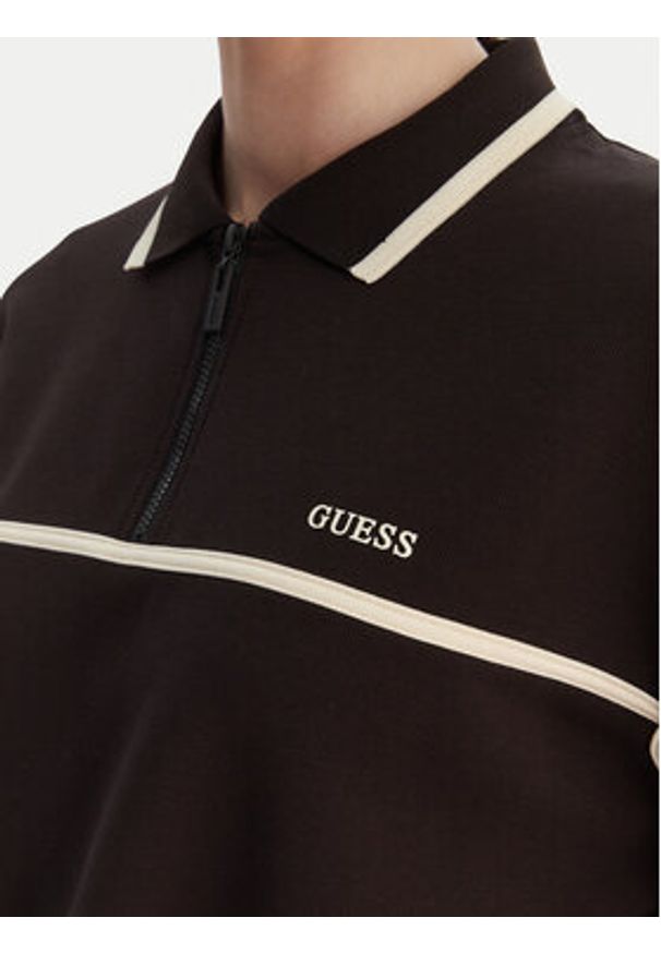 Guess Polo V6GP01 K2945 Brązowy Oversize. Typ kołnierza: polo. Kolor: brązowy. Materiał: syntetyk