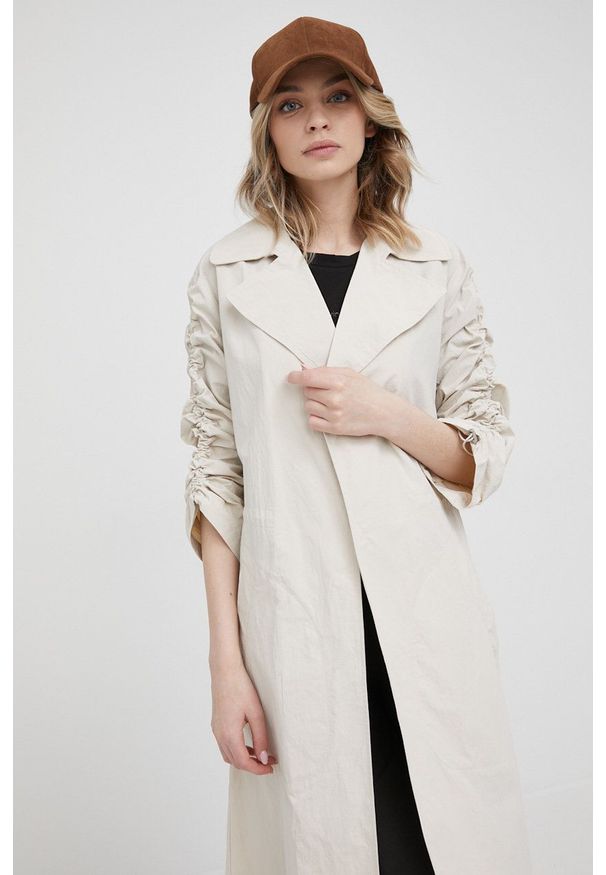 DKNY - Dkny płaszcz damski kolor beżowy przejściowy niezapinany. Okazja: na co dzień. Kolor: beżowy. Styl: klasyczny, casual
