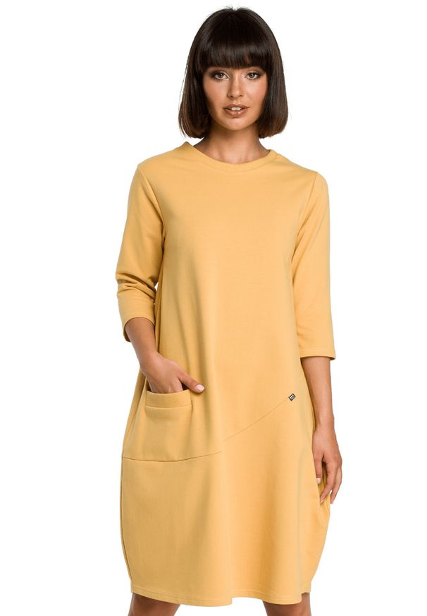 BeWear - Sukienka dresowa bombka oversize z kieszonką z przodu żółta. Okazja: na co dzień. Kolor: żółty. Materiał: dresówka. Typ sukienki: bombki, oversize. Styl: casual