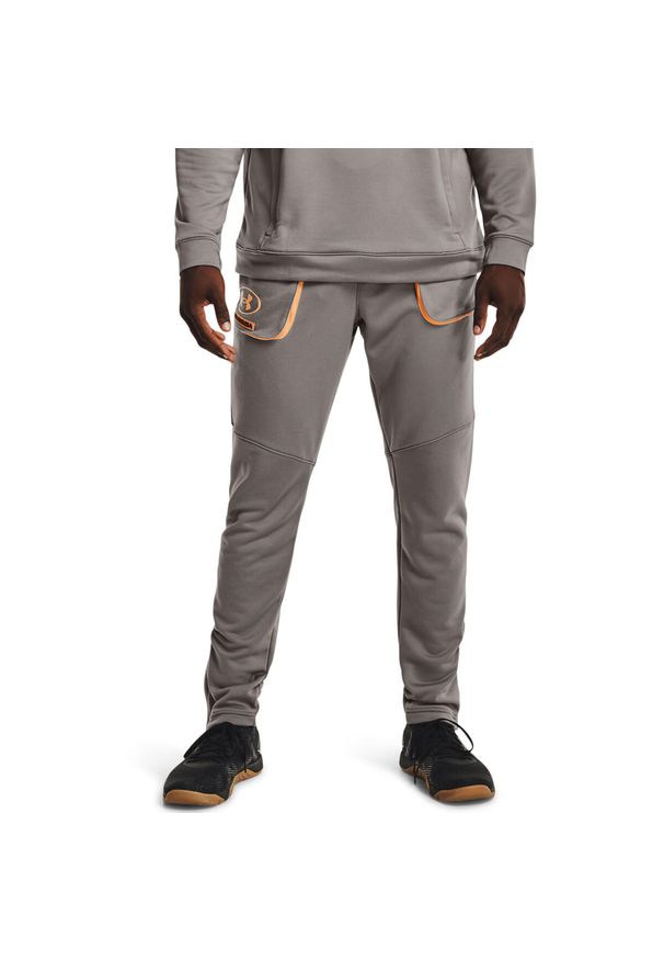 Spodnie Under Armour Terry Evolution, Mężczyźni. Kolor: szary, pomarańczowy, wielokolorowy. Materiał: poliester, materiał. Sport: taniec, joga i pilates