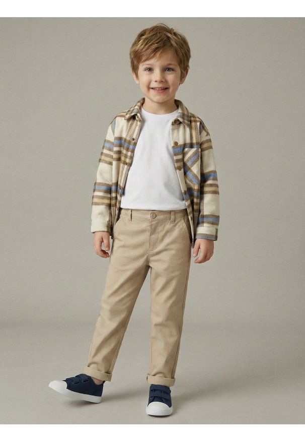 Sinsay - Spodnie typu chinos z elastycznym pasem - beżowy. Kolor: beżowy