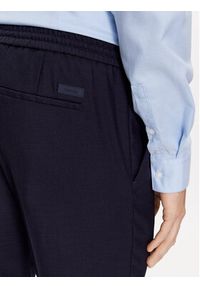 Calvin Klein Spodnie materiałowe K10K109956 Granatowy Regular Fit. Kolor: niebieski. Materiał: wełna #4