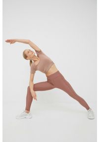 Only Play legginsy treningowe damskie kolor brązowy gładkie. Kolor: brązowy. Materiał: materiał, skóra. Wzór: gładki. Sport: fitness
