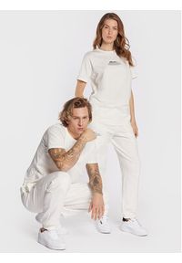 Ellesse Spodnie dresowe Unisex Dimartino SGP16249 Biały Regular Fit. Kolor: biały. Materiał: bawełna, dresówka
