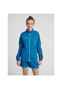 Kurtka damska Hummel Zip hmlAUTHENTIC Poly. Kolor: turkusowy, niebieski, wielokolorowy. Materiał: poliester. Sport: fitness
