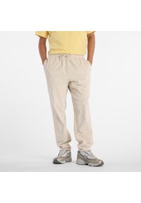 Spodnie męskie New Balance MP53521TWF – beżowe. Kolor: beżowy. Materiał: sztruks, bawełna #1