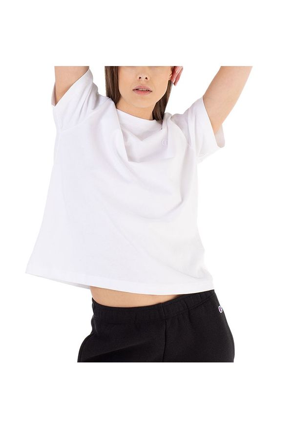 Koszulka Champion Crewneck 116059-WW001 - biała. Kolor: biały. Materiał: materiał, bawełna. Długość rękawa: krótki rękaw. Długość: krótkie. Wzór: aplikacja