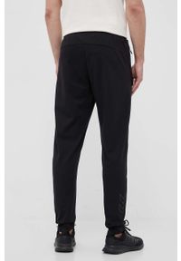Hummel spodnie dresowe Interval kolor czarny gładkie. Kolor: czarny. Materiał: dresówka. Wzór: gładki #4
