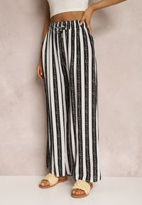 Renee - Czarne Spodnie Kassene. Kolor: czarny. Materiał: tkanina, wiskoza. Wzór: nadruk, aplikacja, paski. Styl: wakacyjny #3