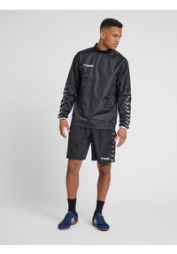 Kurtka przeciwdeszczowa Hummel Authentic Wind Breaker czarna. Typ kołnierza: kołnierzyk stójkowy. Kolor: biały, wielokolorowy, czarny. Materiał: poliester. Sport: fitness