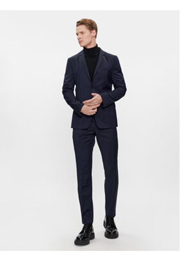 Calvin Klein Chinosy K10K112292 Granatowy Slim Fit. Kolor: niebieski. Materiał: wełna