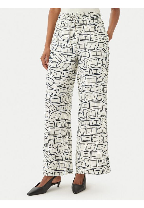 TOMMY HILFIGER - Tommy Hilfiger Spodnie materiałowe WW0WW48970 Beżowy jasny Wide Leg. Kolor: beżowy. Materiał: len