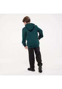 Dres dziecięcy Puma. Kolor: wielokolorowy, czarny, zielony. Materiał: dresówka