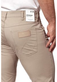 Wrangler - WRANGLER SPODNIE MĘSKIE GREENSBORO CORNSTALK W15QKM335 $. Materiał: materiał #7