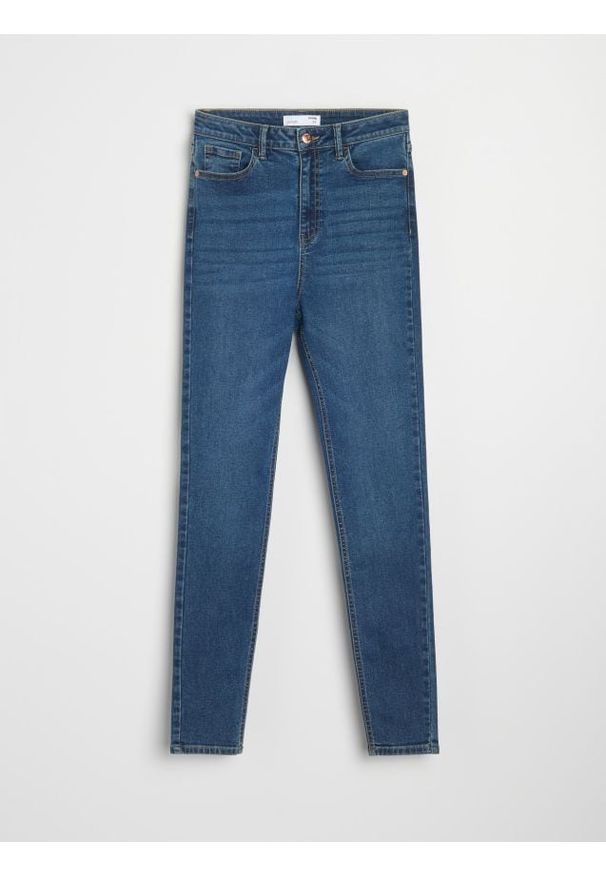 Sinsay - Spodnie jeansowe slim fit - granatowy. Kolor: niebieski