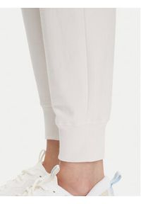 DKNY Sport Spodnie dresowe DP5P3496 Beżowy Regular Fit. Kolor: beżowy. Materiał: bawełna #4